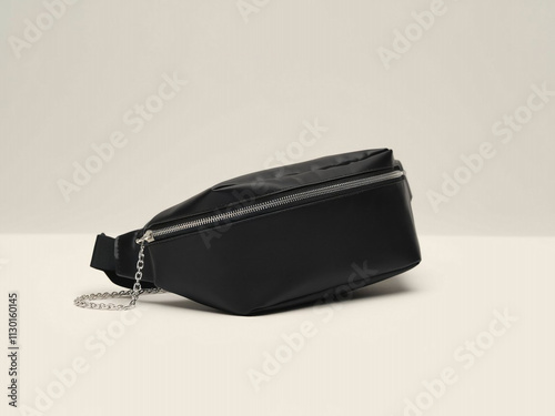 Black blank Fanny pack mockup.Eco friendly stylish trendy Waist pack Zippered Fanny Pack laying flat photo