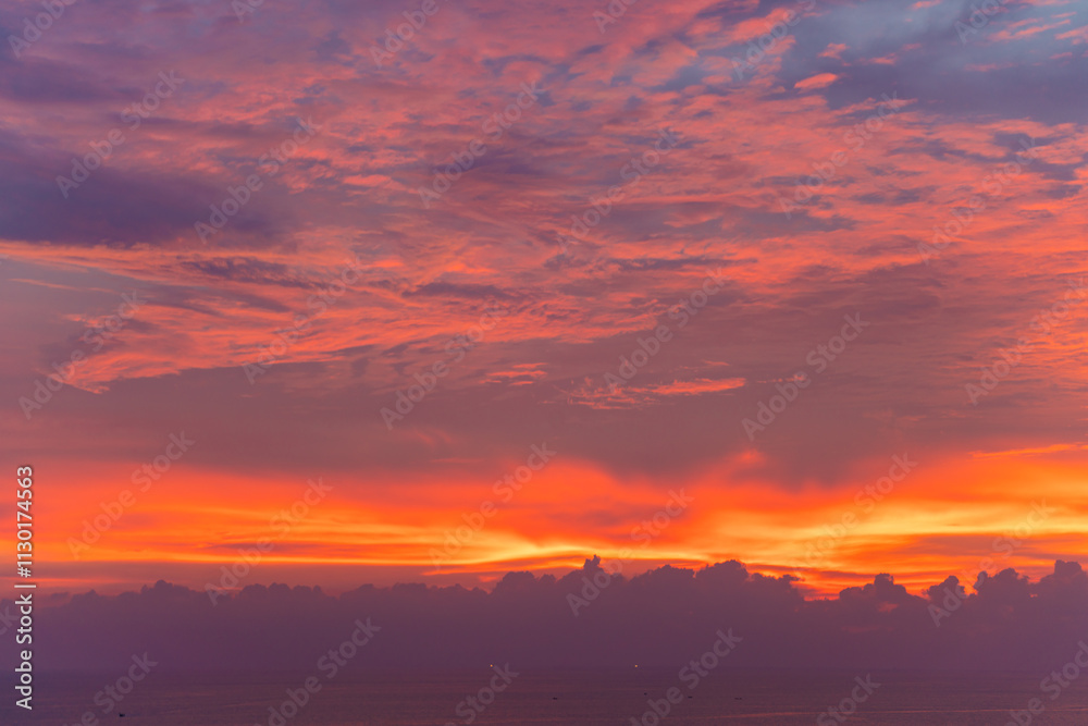 Obraz premium Colourful majestic sunset dramatic sky with cloud on sea shore island summer vacation