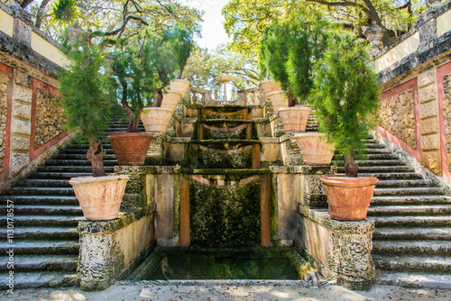 Exploring the beautiful garden at the Vizcaya Museum and gardens near Biscayne Bay, Florida.
