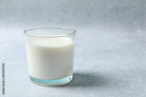 Glass of milk on the table photo