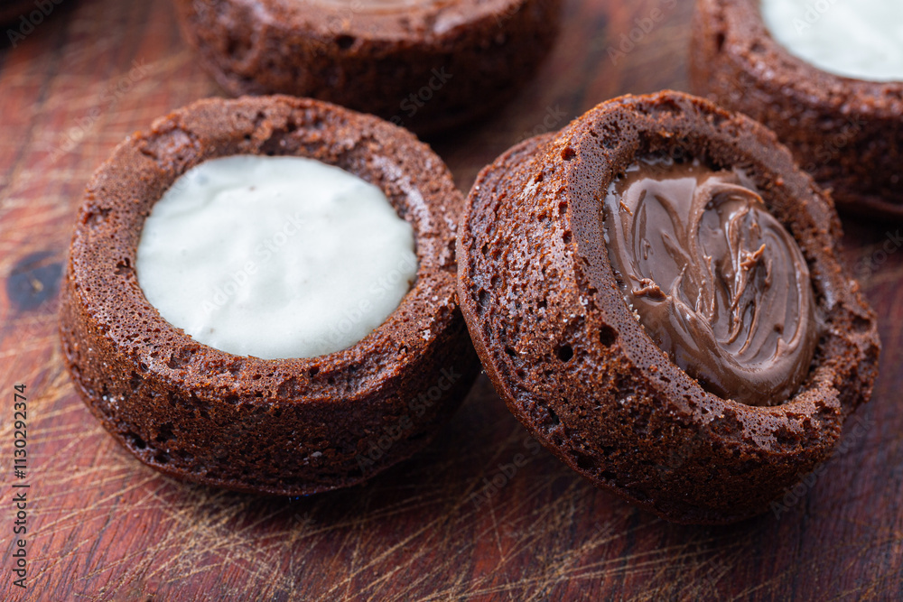 Chocolate Mini Cakes with Decorative White Icing