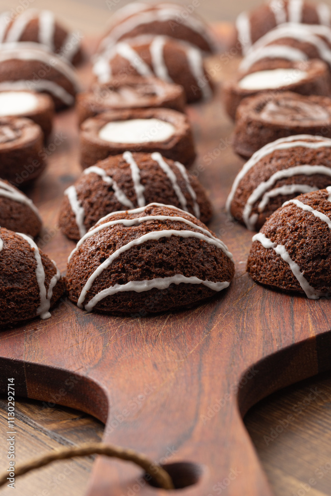 Chocolate Financiers with White Glaze Decoration