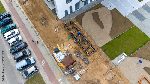 Aerial View of Construction Site and Modern Building photo