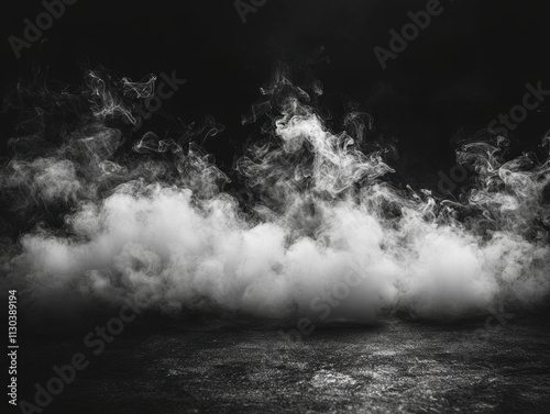 A captivating black and white image of swirling smoke against a dark backdrop. The ethereal mist creates a mysterious and moody atmosphere, perfect for artistic projects or conceptual designs.