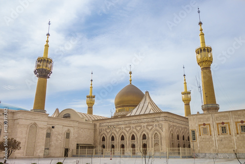 Panorama of the Imam Khomeini Mausoleum complex in Tehran, Iran. Building has quotes from the Koran as ornamentation photo