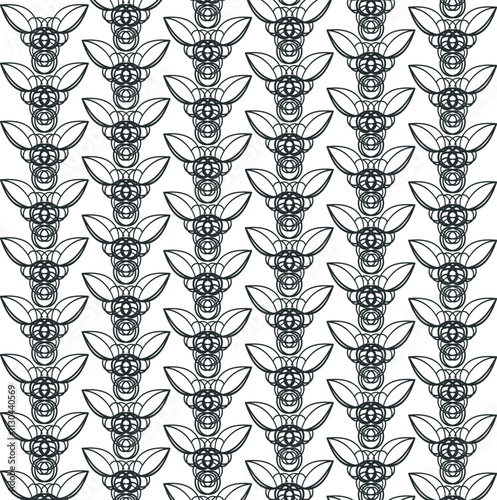 The vertical eared patterns are repeated, shifting in the overall mass.