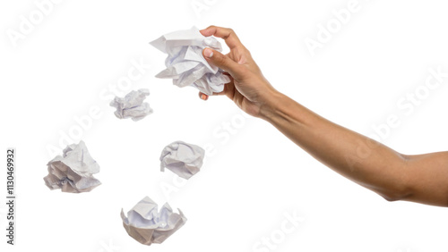 hand throwing crumpled paper