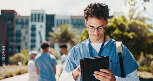 Happy man, internship and medical student with tablet for research, med school or online course at campus. Male person, trainee or junior candidate with smile on technology for health study or app photo