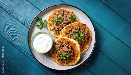 ground Lamb Flatbreads with yogurt  photo