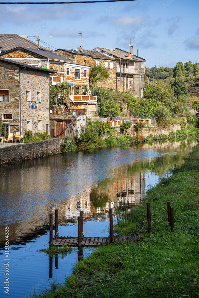 Fototapeta premium Typical houses along the Onor River, Rio de Onor town, municipality of Braganza, Trás-os-Montes and Alto Douro, Portugal