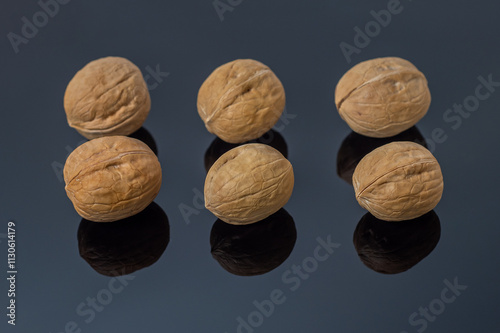 Six Manchurian nuts. Selective focus. Hazelnut close-up. Weapon concept.