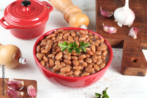 cooked and seasoned beans served in a bowl