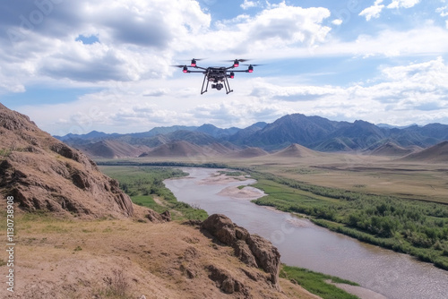 Drone flying over mountainous landscape with river and cloudy sky photo