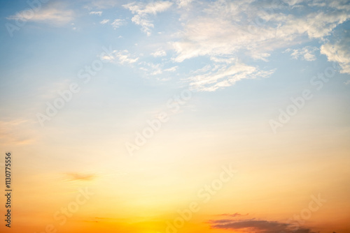 Sky,sunset, beautiful , luxury soft gradient orange gold clouds and sunlight on the blue sky perfect for the background, Sunrise on morning or everning in winter warm time ,Twilight summer,silhouette photo