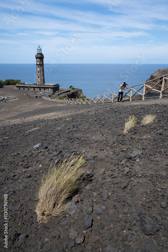 Capelinhos volcano, lighthouse of Ponta dos Capelinhos on western coast on Faial island, Azores photo