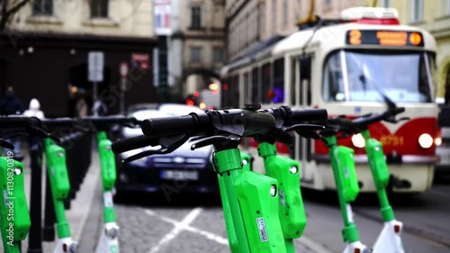 Wallpaper Mural Electric scooter in city street, symbolizing modern urban mobility, eco-friendly transport, convenience, and sustainable lifestyle. Torontodigital.ca