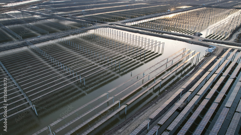 Fototapeta premium Drones capture on-site construction of photovoltaic panels