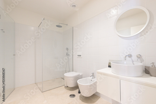 Stylish bathroom showcasing glass shower