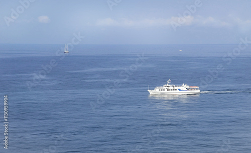 Seascape with horizon line and ship