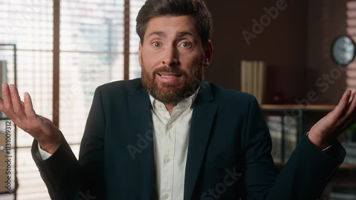 Portrait at office confused uncertain Caucasian man business male company worker problem trouble bad businessman guy looking at camera spread hands shrug shoulder unsure hesitate shrugging ignorance