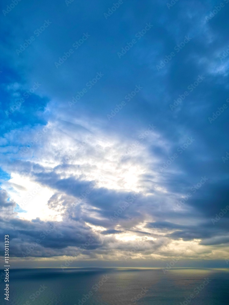 Obraz premium clouds sky sea light shine