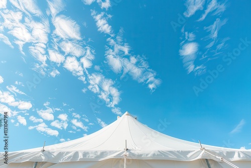 Viewing white tent against blue sky photo