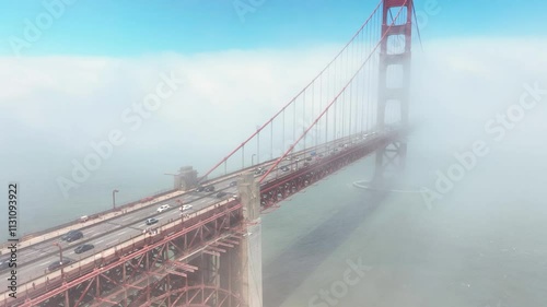 Aerial drone video of a mist and fog shrouded, Golden Gate Bridge, in San Francisco, Ca.