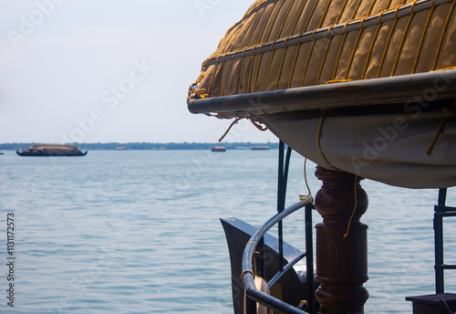 Scenic Houseboat cruise along the Alappuzha backwaters in the indian state of Kerala. Referred to as the Venice of the East.