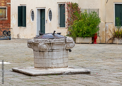 Old Medieval water well in Venice street