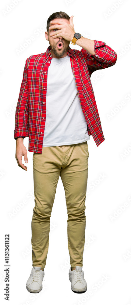 Φωτογραφία Handsome man wearing casual shirt peeking in shock covering face and eyes with hand, looking through fingers with embarrassed expression