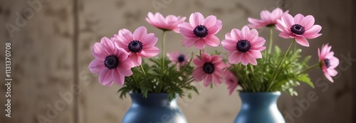 Pink anemone flowers in a vase with blurred background , soft focus, ranunculaceae photo