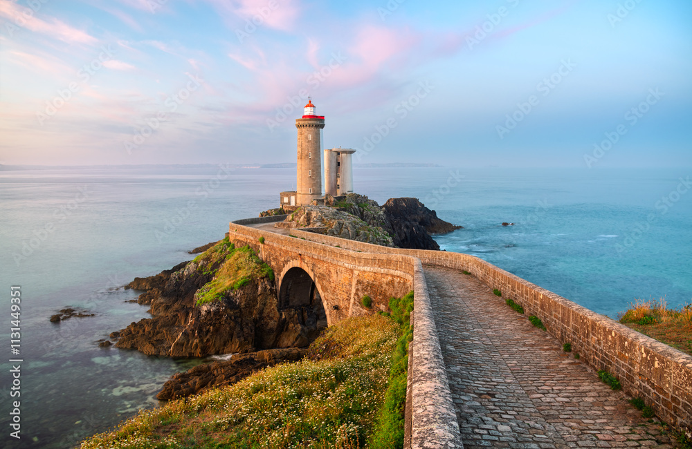 Le Phare du Petit Minou lighthouse in sunrise light, Brest, France