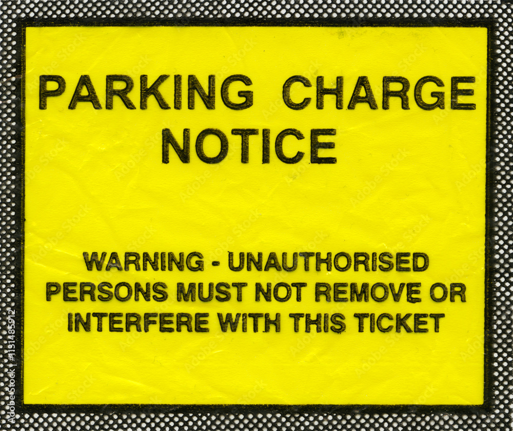 Parking charge notice in the UK showing the message Warning - unauthorised persons must not remove or interfere with this ticket