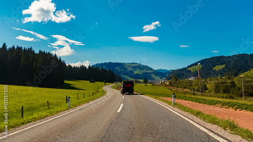 Alpine summer view with the famous Jacob cross in the background near Hochfilzen, Kitzbuehel, Tyrol, Austria