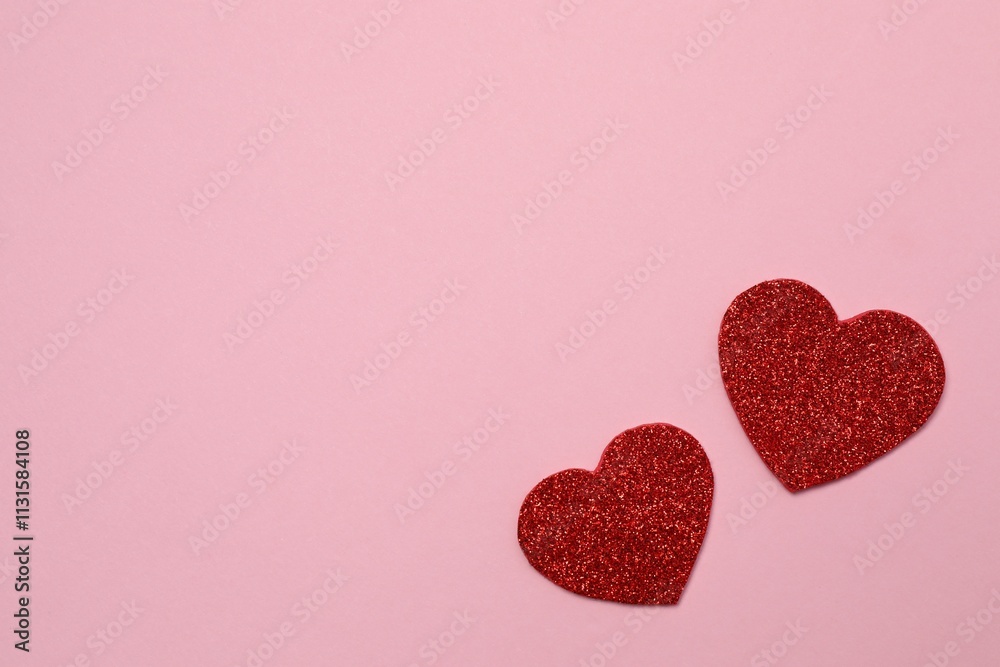 Fototapeta premium Red hearts on pink background