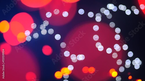 New Year and Christmas garlands red, yellow and white out of focus.