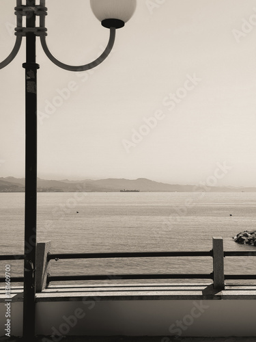 street lamp on the seashore photo