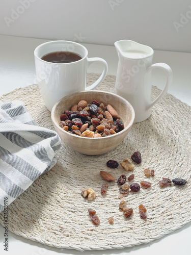 a cup of coffee ,milk and nuts in white background photo