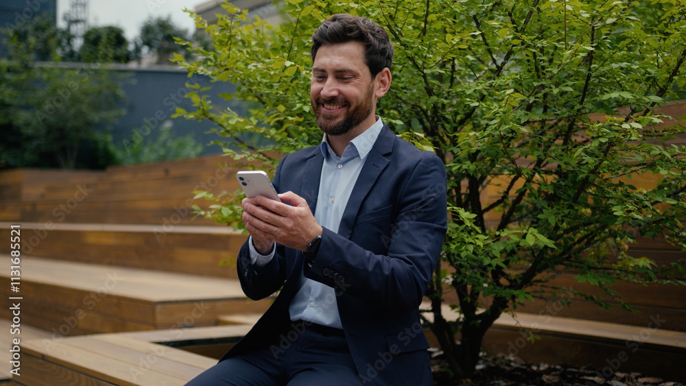 Fototapeta premium Smiling businessman Caucasian employer business man male entrepreneur in city browsing mobile phone internet scrolling media work break outside happy guy drink coffee enjoy morning beverage outdoors