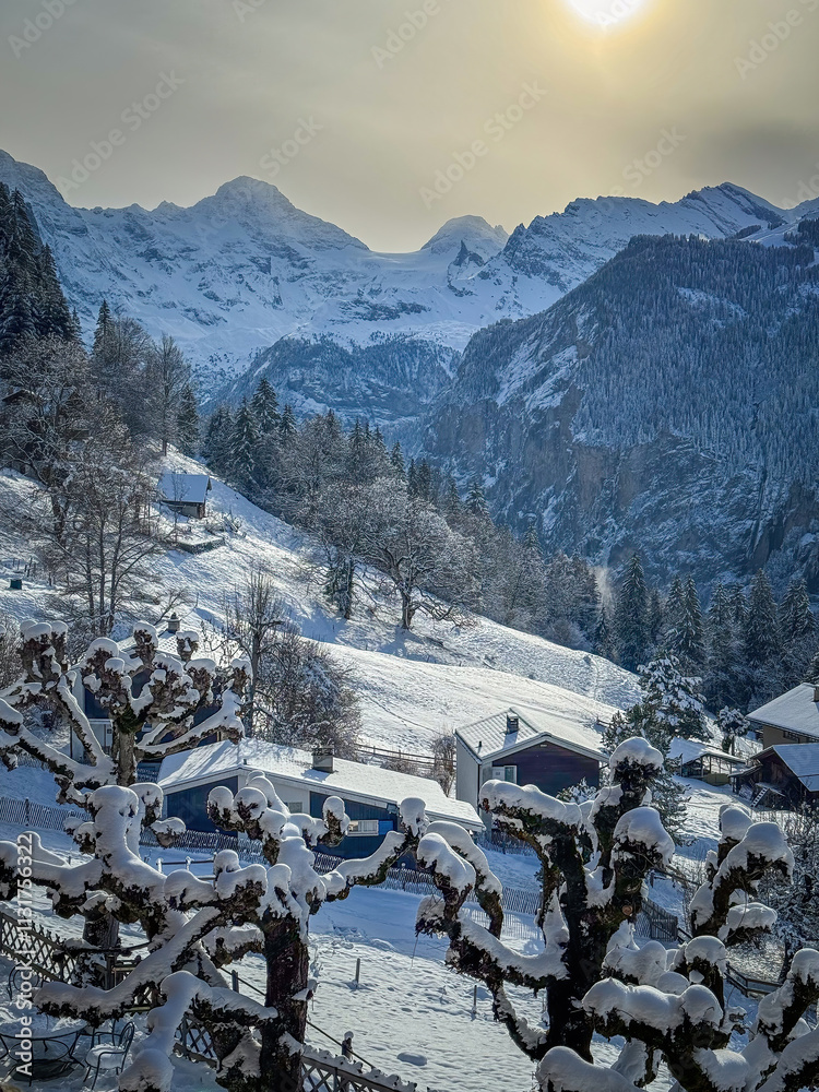 Scenic view of Lauterbrunnen Valley, Switzerland seen from Wengen with snowcovered mountains with Breithorn (left) and Tschingelhorn (right) in winter