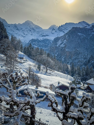 Obraz na płótnie Scenic view of Lauterbrunnen Valley, Switzerland seen from Wengen with snowcovered mountains with Breithorn (left) and Tschingelhorn (right) in winter w salonie