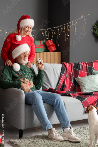 Happy mature couple playing...