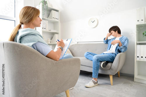 Teenage boy receiving couns...