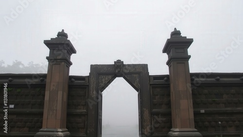 Mystical Gateway: A Hauntingly Beautiful Entrance in the Fog photo