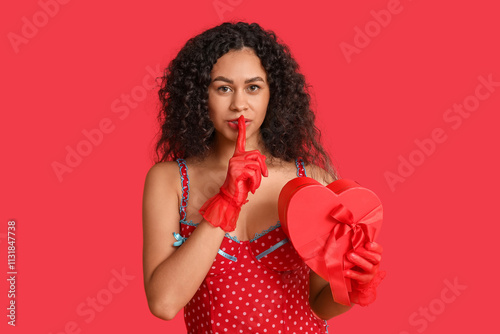 Young woman in red polka do...