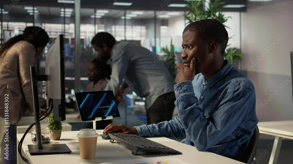 General director in modern office engaged in infographics reports for problem solving tasks, financial planning to support enterprise growth and accomplish strategic objectives. Camera B.