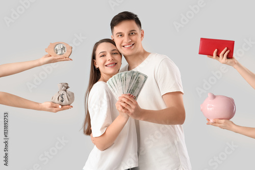 Happy young couple holding ...