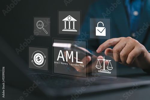 AML : Anti money laundering financial bank concept. Businessman use laptop with virtual AML icon for anti money laundering regulations.