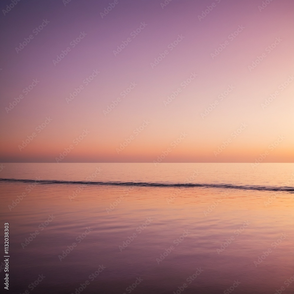 Obraz premium A tranquil seascape during the golden hour with soft sunlight reflecting off the ocean's surface. The sky has warm tones of orange, pink, and purple.