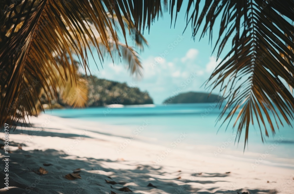 Fototapeta premium Idyllic tropical beach scene viewed through palm fronds, showcasing white sand, turquoise water, and lush green islands in the distance.
